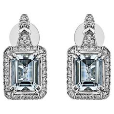 This collection features an array of Aquamarines with an icy blue hue that is as cool as it gets! Accented with Diamonds these Stud Earrings are made in White Gold and present a classic yet elegant look. Aquamarine Stud Earring in 18Karat White Gold with White Diamond. Aquamarine: 2.25 carat, 8X6mm size, Octagon shape White Diamond: 0.02 carat, 1.00mm size, round shape, G color, VS clarity. White Diamond: 0.031 carat, 1.10mm size, round shape, G color, VS clarity White Diamond: 0.312 carat, 1.20 Luxury White Diamond Crystal Earrings, Luxury White Topaz Earrings, Luxury Wedding White Topaz Diamond Earrings, Luxury White Topaz Elegant Earrings, Aquamarine Studs, Octagon Shape, Butterfly Pin, Naha, Icy Blue