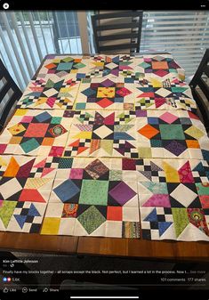 a table with a quilt on top of it