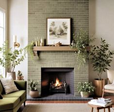 a living room filled with furniture and a fire place in the middle of a fireplace