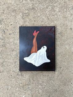 a painting on the ground with a ghost in it