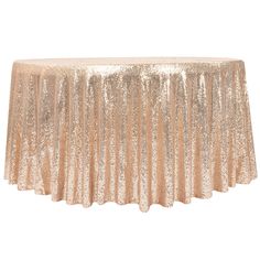 a gold sequin tablecloth on a white background