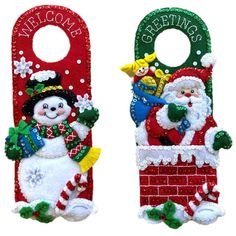 two christmas door hangers decorated with santa claus and snowman on the bottom one has a welcome sign hanging from it's side