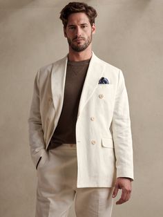 An instant sellout this summer, this iconic suit returns brimming with detail, like charming pick-stitch and interior pocket storage.  A worldly traveler, this suit jacket is crafted from a luxurious blend of plush organic cotton and beautiful, breat Long Sleeve Linen Suits With Patch Pockets, Summer Long Sleeve Suits With Welt Pockets, Double-breasted Cotton Blazer With Pockets, Cotton Double-breasted Blazer With Pockets, Beige Business Outerwear For Summer, Summer Business Beige Outerwear, Summer Beige Business Outerwear, Cream Linen Suit For Spring, Cream Linen Suits For Spring