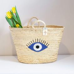 Introducing the Straw Evil Eye Large Bag: Your Perfect Summer Companion Embrace the spirit of summer with our stunning Straw Evil Eye Large Bag. This handcrafted accessory combines traditional craftsmanship with trendy design, making it the ideal choice for beach outings, picnics, or casual city strolls. Exquisite Handmade Craftsmanship Each Straw Evil Eye Large Bag is meticulously handcrafted by skilled artisans, ensuring that every piece is unique and of the highest quality. The natural straw Boho Chic Accessories, Crochet Table Mat, Evil Eye Design, Straw Basket, Festival Accessories, Beach Essentials, Handcrafted Accessories, Beach Tote, Large Bag