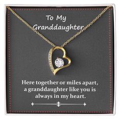 To My GranddaughterHere together or miles apart, a granddaughter like you is always in my heart.The dazzling Forever Love Necklace is sure to make her heart melt! This necklace features a stunning 6.5mm CZ crystal surrounded by a polished heart pendant embellished with smaller crystals to add extra sparkle and shine. Beautifully crafted with either a white gold or yellow gold finish, be sure to give her a classic gift she can enjoy everyday. 14k white gold finish or 18k yellow gold finish 6.5mm Valentine's Day Anniversary Jewelry With Gift Box, Personalized Cubic Zirconia Jewelry For Mother's Day, Cubic Zirconia Jewelry For Mother's Day, Birthstone Necklace With Hallmark For Valentine's Day Gift, Valentine's Day Gift Birthstone Necklace With Hallmark, Valentine's Day Birthstone Necklace With Hallmark, Anniversary Gift Jewelry With Hallmark, Heart-shaped Jewelry For Valentine's Day With Gift Box, Heart-shaped Cubic Zirconia Birthday Jewelry