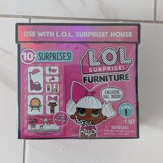 the box has an image of a doll on it