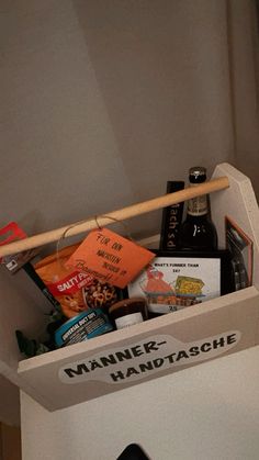 a white box filled with assorted items on top of a table