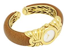 Round white dial with gold baton hands, 18k gold case between fluted gold shoulders, to the 18k gold spring bracelet with interchangeable bands. Includes eight interchangeable leather bands. Signed Bulgari. There is slight wear to the leather bands. Includes manufacturer's box. Luxury Gold Evening Watch, Timeless Yellow Gold Leather Jewelry, Luxury Formal Watch With Gold Clasp, Elegant Yellow Gold Watches With Leather Strap, Elegant Yellow Gold Leather Watch Accessories, Luxury Gold Watch Accessories With Leather Strap, Elegant Leather Jewelry With Gold Clasp, Timeless Leather Gold Jewelry, Designer Gold Watch With Bracelet Strap