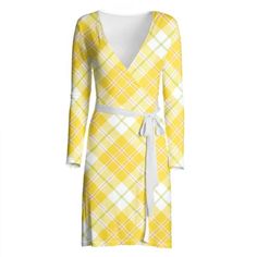 The Sunny Plaid Wrap Dress is the perfect combination of style and comfort. Available in two stunning fabrics, Solange Silky Jersey and Soft Fashion Jersey, this slim fit wrap dress features a belt tie at the waist and sits just above the knee. The top stitch cleavage and belt add an elegant touch to this printed wrap dress. The kimono wrap design includes a small partition in the seam of the right-hand side seam to feed the belt through and create the well-known wraparound effect. The long tape Plaid Wrap Dress, Soft Fashion, Kimono Wrap, Belt Tie, Xl Dress, Above The Knee, Plaid Pattern, Dresses Xs, The Well