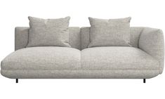 a gray couch with two pillows on it