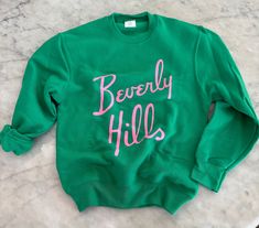 Soft Kelly green  sweatshirt with a cute pink print. We have the adult size to match as well!  So you can Twin  Unisex youth sizes Med to youth xl Small 6-8 yrs old  Med - 8-10 yrs old Large 12-14 Xlarge. 14-16  Matching adult sizes also listed 💗 Pink Pre-shrunk Cotton Sweatshirt, Green Spring Sweatshirt With Screen Print, Spring Green Sweatshirt With Screen Print, Cute Green Tops With Name Print, Green Cotton Sweatshirt With Screen Print, Green Cotton Screen Print Sweatshirt, Green Screen Print Sweatshirt For Spring, Cute Green Sweatshirt For Spring, Casual Pink Pre-shrunk Sweatshirt