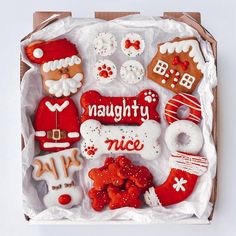 a box filled with assorted decorated cookies