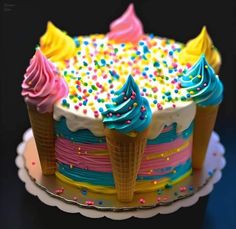 an ice cream cake decorated with sprinkles and frosting