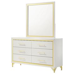 a white dresser and mirror with gold trimmings on the bottom, against a white background