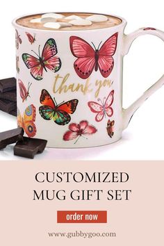 a coffee mug with butterflies on it and the words, customized mug gift set order now