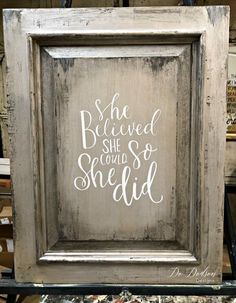 an old frame with the words she believe she could so she did