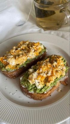 two pieces of bread on a white plate