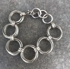 Silpada classic, vintage circle bracelet, solid sterling, good weight. the bracelet is adjustable and can fit up to an 8 inch wrist. box not included. please message me with any questions. purchases of multiple items are eligible for combined shipping discount, thanks! Nickel-free Adjustable Sterling Silver Oval Link Bracelet, Adjustable Nickel-free Oval Link Sterling Silver Bracelet, Metal Chain Bracelet With Sterling Silver Clasp, Chain Bracelet With Sterling Silver Clasp, Silver Chain Bracelet With Jump Ring, Adjustable Round Chain Bracelet With Polished Finish, Classic Sterling Silver Nickel-free Bracelet, Nickel-free Classic Sterling Silver Bracelet, Sterling Silver Bracelet With Spring Ring Clasp