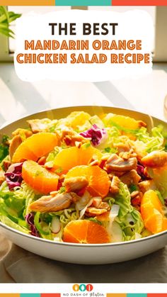 the best mandarin orange chicken salad recipe in a white bowl on top of a table