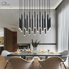 a modern dining room with white chairs and black chandelier