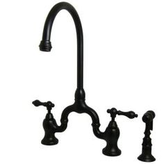 the faucet is black and has three handles