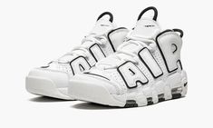 The Women’s Nike Air More Uptempo “White/Black” is a women’s-exclusive version of the ‘90s basketball shoe in a versatile white and black colorway.  The upper features large “AIR” branding outlined in black that brings a ‘90s-style, graffiti-inspired look to the table.  A black jeweled Swoosh is found on the heel and a black Swoosh is embroidered on the toe.  A black Swoosh appears on the tongue.  The shoe’s upper is constructed in perforated white leather.  Two pull tabs on the tongue and heel 90s Basketball Shoes, White Black Shoes, 90s Basketball, Nike Air More Uptempo, Nike Air More, Shoe Storage Solutions, Shoe Wardrobe, Casual Sneakers Women, Stylish Boots