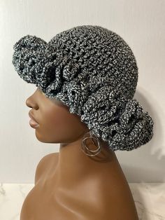 Hand crocheted beanie with a dramatic ruffled brim. Made with 100% acrylic yarn. Fits an average sized teen/adult. Crocheted Beanie, Crochet Ruffle, Crochet Beanie, Bucket Hats, Kissimmee, Crochet Hat, Hand Crochet, Acrylic Yarn, Caps Hats