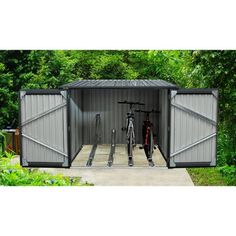 an outdoor storage shed with two bikes in it