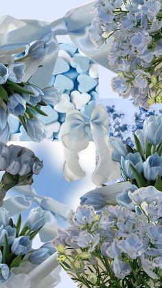 blue and white flowers are arranged in an arrangement