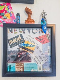 there are many items on the wall in this room, such as a framed photo