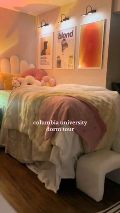 there is a bed with pillows and blankets on it in the room that says columbia university dorm tour