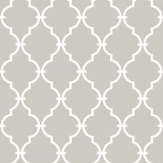 a gray and white wallpaper with an intricate design on it's side, in the shape of a trellis