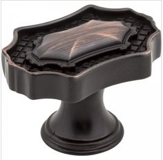 an image of a black and gold decorative knob