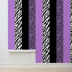 an animal print wallpaper with purple and black stripes