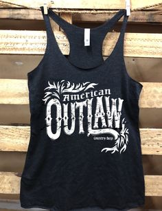 Country Deep American Outlaw racer back tank top Country Deep tank top Next Level Racer back tri blend tank top, 4.3 oz. 50% Poly 25% Cotton 25% Rayon; fits 1/3 size bigger than normal size for a looser fit Outlaw Country, Muscle Tank Tops, Top 4, Top Photo, Racer Back, Shirt Ideas, Racerback Tank, Womens Tank, Tank Top Fashion