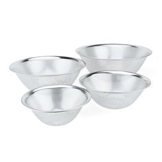 three stainless steel colanders sitting on top of each other