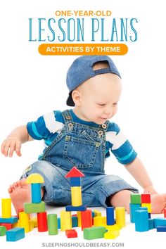 a baby sitting on the floor playing with blocks and toys for one year old lesson plans