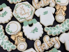 decorated baby shower cookies on a tray