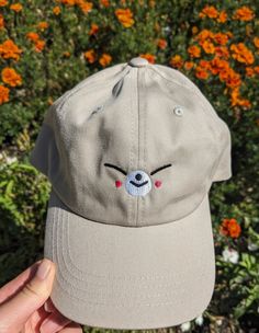 If you love Stray Kids and therefore Skzoo, this was made for you. Perhaps the CUTEST way to rep your bias in a subtle way. This is made from a 100% chino cotton twill white cap.  If you have more than one bias (which who doesn't), or want to match with someone else, I do have the whole skzoo collection up in my shop! Most members I have as both a cap and a bucket hat, so whatever you need, I have covered.  This product is made especially for you as soon as you place an order, which is why it takes us a bit longer to deliver it to you. Making products on demand instead of in bulk helps reduce overproduction, so thank you for making thoughtful purchasing decisions! Cute Hats With Embroidered Logo And Curved Brim, Cute Embroidered Adjustable Baseball Cap, Cute Baseball Cap With Embroidered Logo, Cute Adjustable Baseball Cap With Embroidered Logo, Cute Dad Hat With Curved Brim, Cute Baseball Cap With Embroidered Logo And Curved Brim, Stray Kids Fashion, Kpop Merchandise, Kids Fans