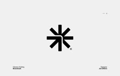 an image of a black and white logo with the letter k in it's center