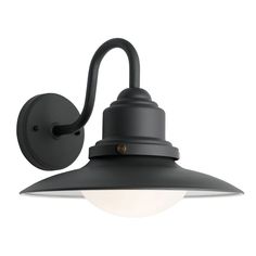 an outdoor wall light that is black and has a white bulb on the side of it