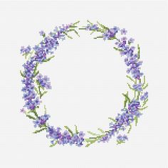 a cross stitched frame with purple flowers