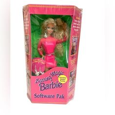 the barbie doll is in its pink box