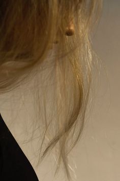 the back of a woman's head with long hair