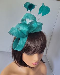 Turquoise Colour Fascinator With Flower Headband is attached Wedding Hat,Royal Ascot Ladies Day Size: small size  approx  Small size  Material:- Sinamay,Feathers Note :- I can't accept return.. Thanks                                                          Customer's returns fascinator or other items  to me so shop will deduct shipping cost from refund  Which shipping cost shop will pay or paid for customer orders  Thank you Elegant Turquoise Fascinator For Races, Adjustable Hair Accessories With Handmade Flowers For Formal Occasions, Formal Hair Accessories With Handmade Flowers, Green Headband Fascinator For Wedding, Elegant Turquoise Fascinator For Royal Ascot, Turquoise Headpiece For Summer Wedding, Turquoise Headpieces For Summer Weddings, Green Headband Mini Hat For Wedding, Elegant Turquoise Headpiece For Wedding