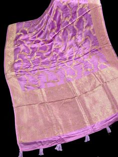 Statement Lilac Color Pure Satin Silk Saree Handwoven Saree with Gold Zari Weaving. Item : SareeColor : Lilac Color Base Fabric : Pure Satin Silk Blouse piece : YesFall & Edging(Pico) Yes/No : Yes Silk Mark Certified : Yes Disclaimer -:- Color variation is possible due to various reasons like phone or desktop setting, resolution etc. Please don't hold us responsible. Our aim is to put the exact color of the Saree.- Colors are very Subjective. Hence a color understood by us can be different then Purple Dupatta With Pallu For Celebration, Celebration Purple Dupatta With Pallu, Transitional Purple Banarasi Silk Dupatta, Purple Silk Dupatta With Self Design, Purple Dupatta With Zari Weaving For Celebrations, Purple Banarasi Silk Dupatta With Self Design, Celebration Jamawar Dupatta With Pallu, Celebration Jamawar Dupatta With Self Design, Transitional Katan Silk Dupatta For Celebration