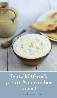 greek yogurt and cucumber sauce with pita bread on the side