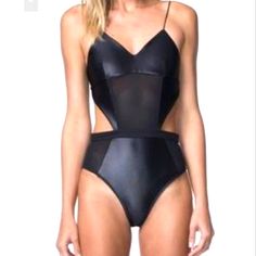 Black Shimmery Cutout One Piece Swimsuit Size S (No Size Or Tags Sample Piece) Did Measure Please Look At Measurements Before Purple New With No Tags Has A Stain As Seen In 3rd Picture Doesn't Show Very Minimal Since Is Black Chic Black Nylon Bodysuit, Black Nylon Bodysuit For Party, Black Nylon Bodysuit For Night Out, Black Nylon Bodysuit With Lined Body, Chic Black Sheer Swimwear, Black Fitted Sheer Swimwear, Black Sheer Fitted Swimwear, Fitted Sheer Black Swimwear, Cutout Swimsuit