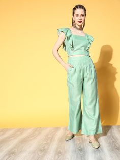 Product Features: Sea green & golden striped top Square Neck Sleeveless Ruffle Detail Trouser Design Sea green & golden striped trousers Partially elasticated Pleated design One pocket Slip on closure Size & Fit: The model (height 5'8) is wearing a size S Material & Care: Top design: Cotton Blend, Bottom design: Cotton Blend, Hand wash SKU#: 10140174GR Disclaimer: There may be slight difference in actual product color compared to product images. Striped Kurta, Sleeveless Kurta, Striped Trousers, Kurta Style, Trouser Design, Bottom Design, Green Bottom, Co Ords, Co Ord Set