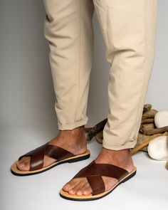 Greek leather sandals for men are a timeless and classic choice in footwear. They are handmade from high-quality leather and are both comfortable and durable. Their simple yet elegant design makes them a must-have for any fashion-conscious man's wardrobe, and they are suitable for any occasion, from a casual day out to a more formal event. All of our products are handmade with the best and highest quality leather from our beloved island of ''Crete''.  The leather used for each item may be irregu Brown Leather Footbed Toe Ring Sandals, Leather Sandals For Men, Mens Shoes Sandals, Sandals For Men, Mens Leather Sandals, Genuine Leather Sandals, Greek Sandals, Leather Slides, Men's Wardrobe